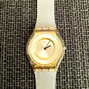 Swatch skin watch, gold details